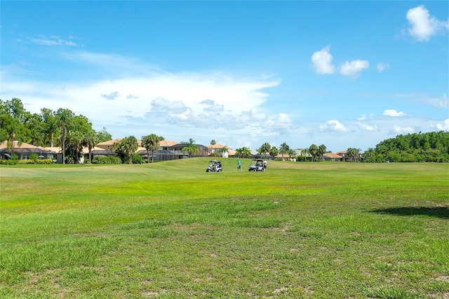 362 Fairway Isles Ln, Bradenton, FL 34212 - view of home's community featuring a residential view, a yard, and view of golf course