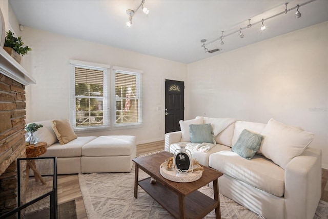 520 27th St W, Bradenton, FL 34205 - living area with rail lighting and wood finished floors