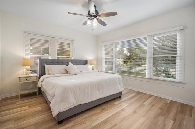 520 27th St W, Bradenton, FL 34205 - bedroom featuring multiple windows, light wood-style floors, and ceiling fan