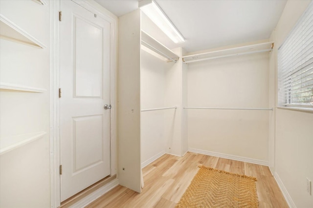 520 27th St W, Bradenton, FL 34205 - spacious closet featuring wood finished floors