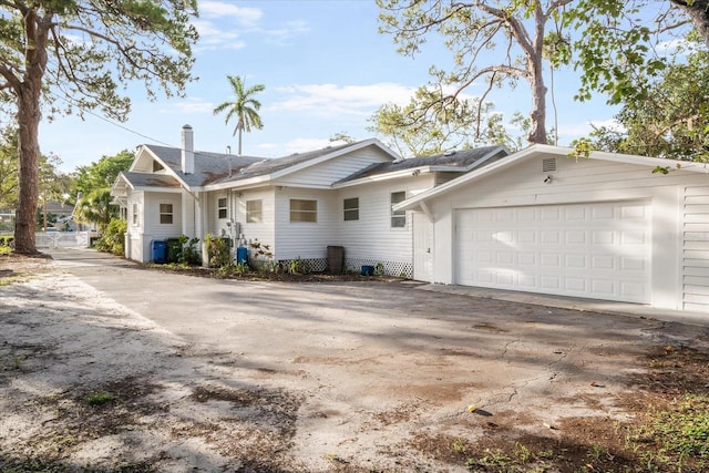 520 27th St W, Bradenton, FL 34205 - view of front of home featuring concrete driveway and an attached garage