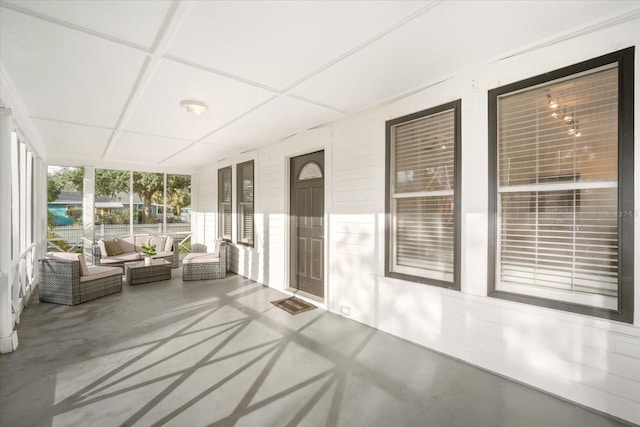 520 27th St W, Bradenton, FL 34205 - sunroom with a wall of windows and finished concrete floors
