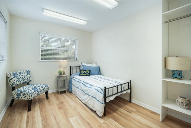 520 27th St W, Bradenton, FL 34205 - bedroom featuring light wood-style floors and baseboards