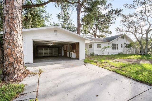 520 27th St W, Bradenton, FL 34205 - single story home with concrete driveway and an attached garage