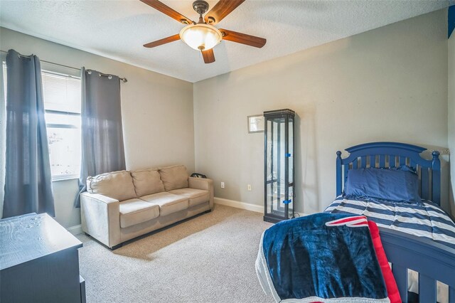 3041 Stonegate Falls Dr, Land O Lakes, FL 34638 - bedroom with carpet floors, ceiling fan, and a textured ceiling