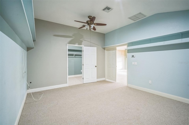 3041 Stonegate Falls Dr, Land O Lakes, FL 34638 - unfurnished bedroom with carpet flooring, vaulted ceiling, ceiling fan, and a closet