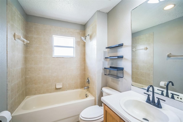 3041 Stonegate Falls Dr, Land O Lakes, FL 34638 - full bathroom with a textured ceiling, bathing tub / shower combination, vanity, and a textured wall