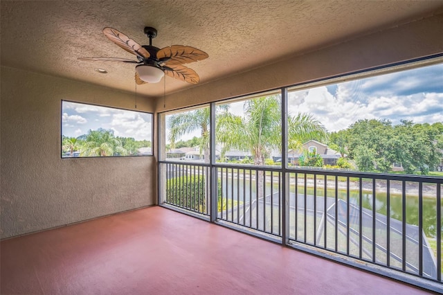 3041 Stonegate Falls Dr, Land O Lakes, FL 34638 - unfurnished sunroom with a water view