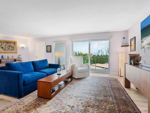 2295 Gulf Of Mexico Dr Unit 64S, Longboat Key, FL 34228 - living room with light wood-style flooring