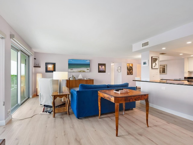 2295 Gulf Of Mexico Dr Unit 64S, Longboat Key, FL 34228 - living room featuring light wood-type flooring and recessed lighting