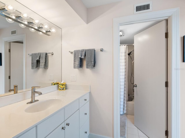 2295 Gulf Of Mexico Dr Unit 64S, Longboat Key, FL 34228 - full bathroom featuring vanity, tile patterned flooring, and shower / bath combo