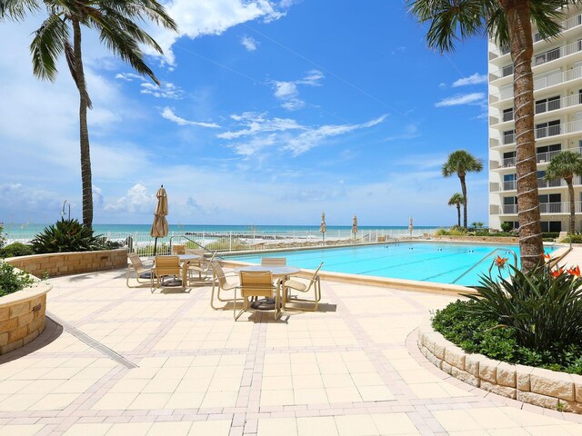 2295 Gulf Of Mexico Dr Unit 64S, Longboat Key, FL 34228 - community pool featuring a patio