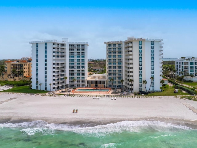 2295 Gulf Of Mexico Dr Unit 64S, Longboat Key, FL 34228 - view of building exterior featuring view of water and beach