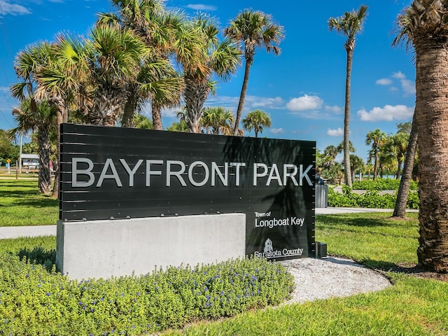 2295 Gulf Of Mexico Dr Unit 64S, Longboat Key, FL 34228 - community / neighborhood sign featuring a yard
