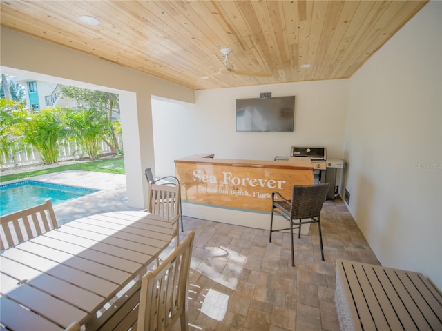 111 6th St N, Bradenton Beach, FL 34217 - dining area featuring wooden ceiling and wood finished floors