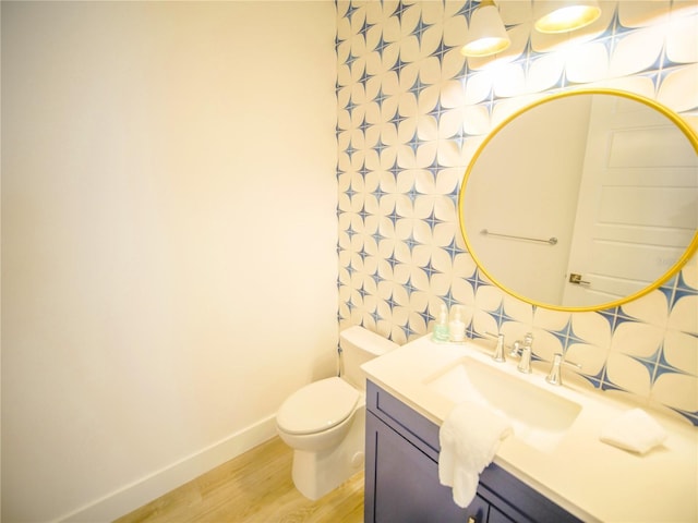 111 6th St N, Bradenton Beach, FL 34217 - half bathroom featuring vanity and wood finished floors