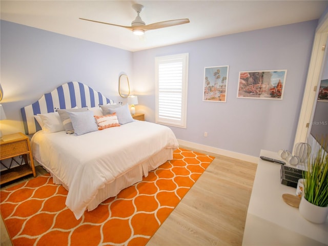 111 6th St N, Bradenton Beach, FL 34217 - bedroom featuring wood finished floors and ceiling fan