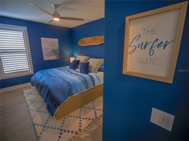 111 6th St N, Bradenton Beach, FL 34217 - bedroom with wood finished floors and a ceiling fan