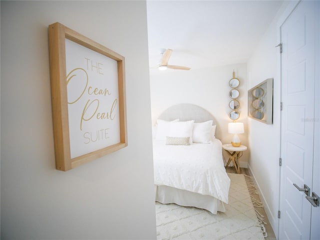 111 6th St N, Bradenton Beach, FL 34217 - bedroom featuring ceiling fan and baseboards