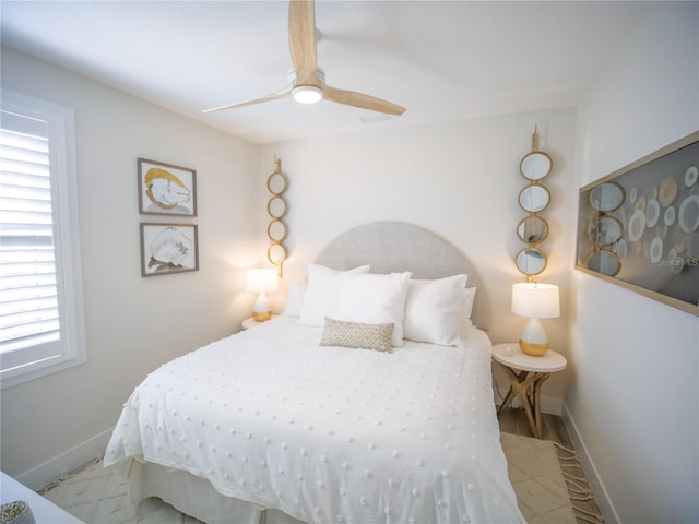 111 6th St N, Bradenton Beach, FL 34217 - bedroom featuring a ceiling fan and wood finished floors