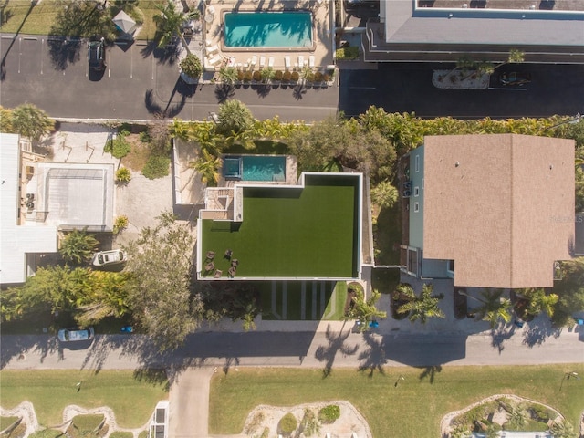 111 6th St N, Bradenton Beach, FL 34217 - aerial view of property and surrounding area with a pool area