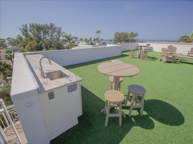111 6th St N, Bradenton Beach, FL 34217 - view of grassy yard featuring a sink