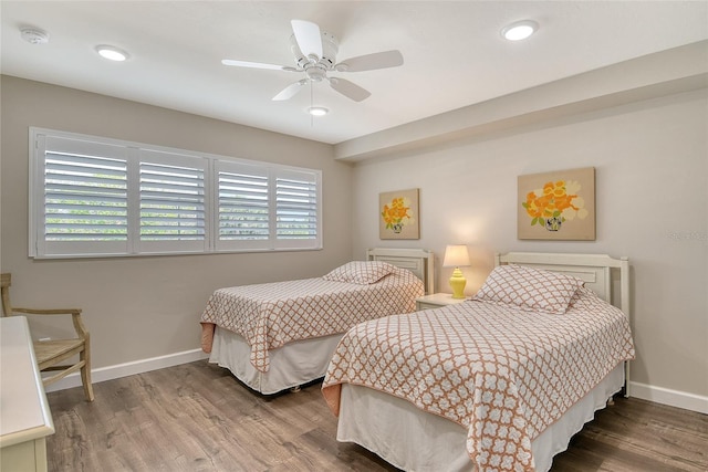 4325 Gulf Of Mexico Dr Unit 204, Longboat Key, FL 34228 - bedroom with wood finished floors, a ceiling fan, and recessed lighting