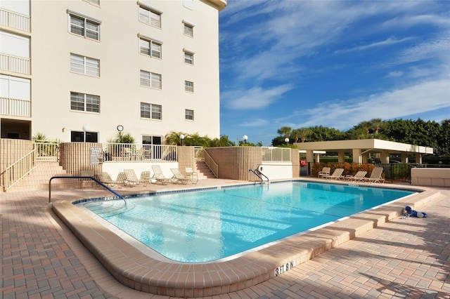 4325 Gulf Of Mexico Dr Unit 204, Longboat Key, FL 34228 - community pool with a patio area