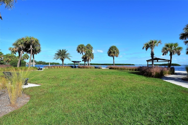 4325 Gulf Of Mexico Dr Unit 204, Longboat Key, FL 34228 - surrounding community with a lawn and a water view
