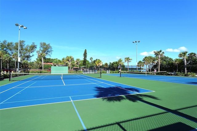 4325 Gulf Of Mexico Dr Unit 204, Longboat Key, FL 34228 - view of tennis court with community basketball court