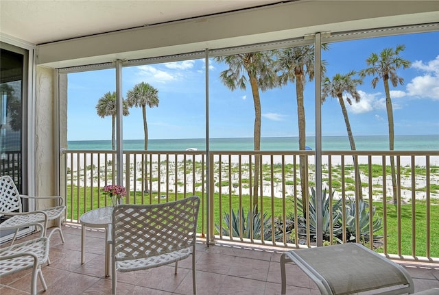 4325 Gulf Of Mexico Dr Unit 204, Longboat Key, FL 34228 - sunroom / solarium featuring view of water and beach