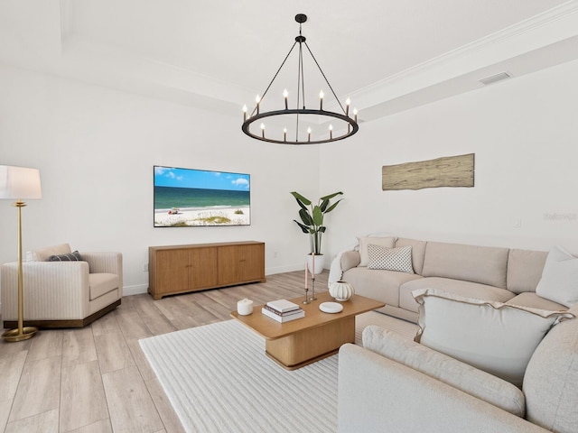 10120 Carnoustie Pl, Bradenton, FL 34211 - living area with light wood-type flooring and a chandelier