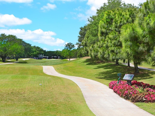 10120 Carnoustie Pl, Bradenton, FL 34211 - view of home's community with golf course view, a yard, and view of scattered trees