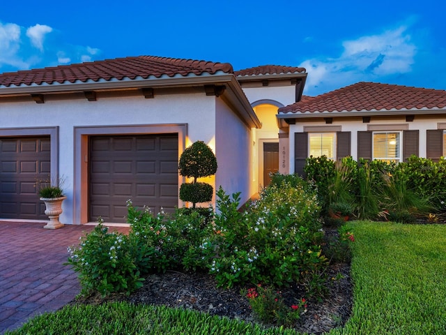 10120 Carnoustie Pl, Bradenton, FL 34211 - mediterranean / spanish-style house with stucco siding and a tiled roof