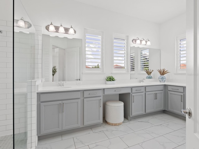 10120 Carnoustie Pl, Bradenton, FL 34211 - full bathroom with marble look tiles, double vanity, and a tile shower