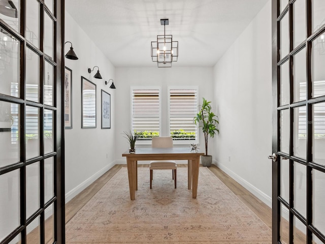 10120 Carnoustie Pl, Bradenton, FL 34211 - home office with light wood-style floors and healthy amount of natural light