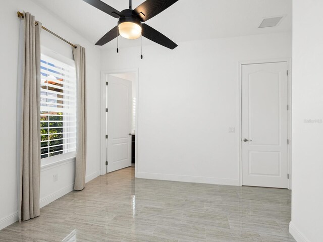 10120 Carnoustie Pl, Bradenton, FL 34211 - empty room with ceiling fan and baseboards