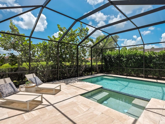 10120 Carnoustie Pl, Bradenton, FL 34211 - view of pool featuring a patio area, a pool with connected hot tub, and glass enclosure
