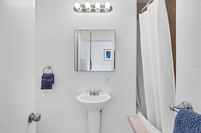 1168 Westway Dr, Sarasota, FL 34236 - bathroom with a sink and a shower with curtain