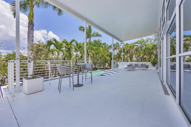 1168 Westway Dr, Sarasota, FL 34236 - patio / terrace with an outdoor living space