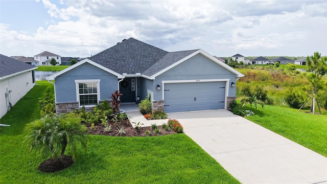 6435 165th Dr E, Parrish, FL 34219 - view of front of property featuring stone siding, a garage, a front lawn, stucco siding, and concrete driveway