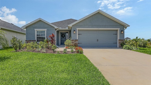 6435 165th Dr E, Parrish, FL 34219 - ranch-style home featuring stucco siding, stone siding, a front yard, and driveway