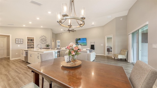 6435 165th Dr E, Parrish, FL 34219 - dining area with a chandelier, light wood-style flooring, and recessed lighting
