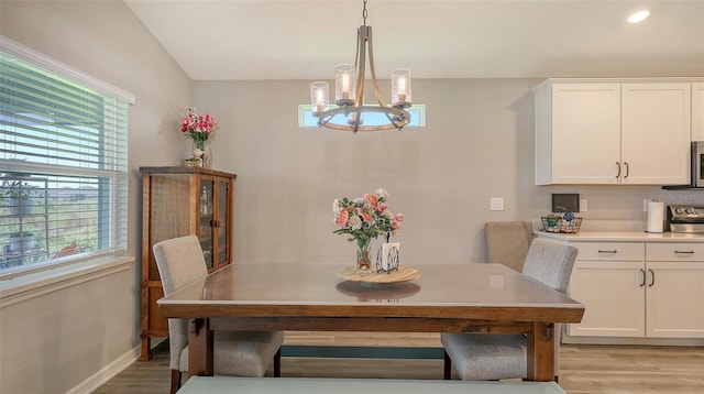 6435 165th Dr E, Parrish, FL 34219 - dining area featuring plenty of natural light, light wood-style floors, a chandelier, and recessed lighting