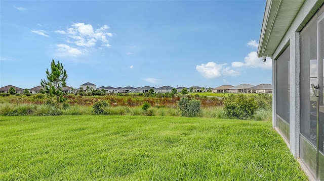 6435 165th Dr E, Parrish, FL 34219 - view of green lawn featuring a residential view