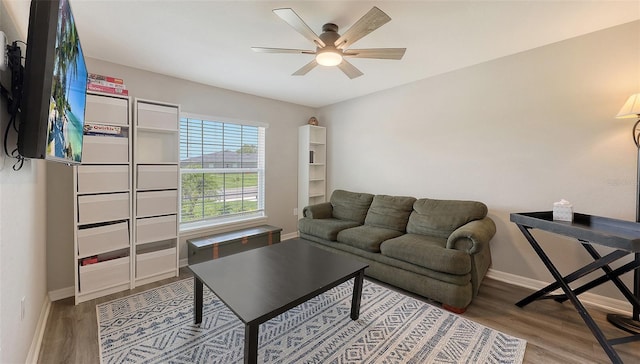 6435 165th Dr E, Parrish, FL 34219 - living room with a ceiling fan and wood finished floors