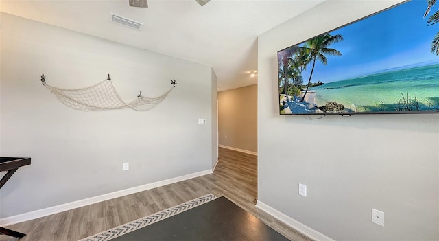 6435 165th Dr E, Parrish, FL 34219 - spare room featuring wood finished floors and baseboards