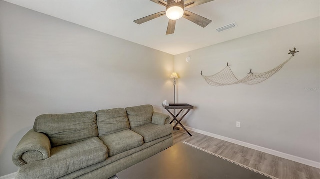6435 165th Dr E, Parrish, FL 34219 - living area with a ceiling fan and wood finished floors