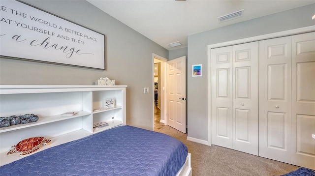 6435 165th Dr E, Parrish, FL 34219 - carpeted bedroom with a closet and baseboards