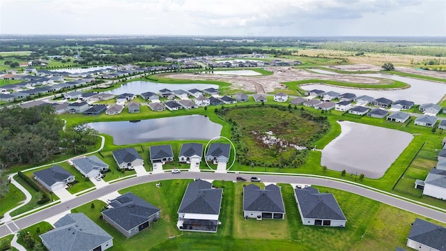 6435 165th Dr E, Parrish, FL 34219 - aerial view of residential area featuring a nearby body of water